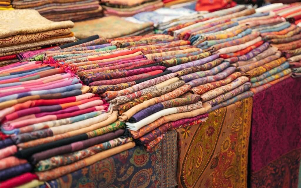 Beautifully embroidered shawls and stoles made of self-fabric are often worn by ladies in Pakistan