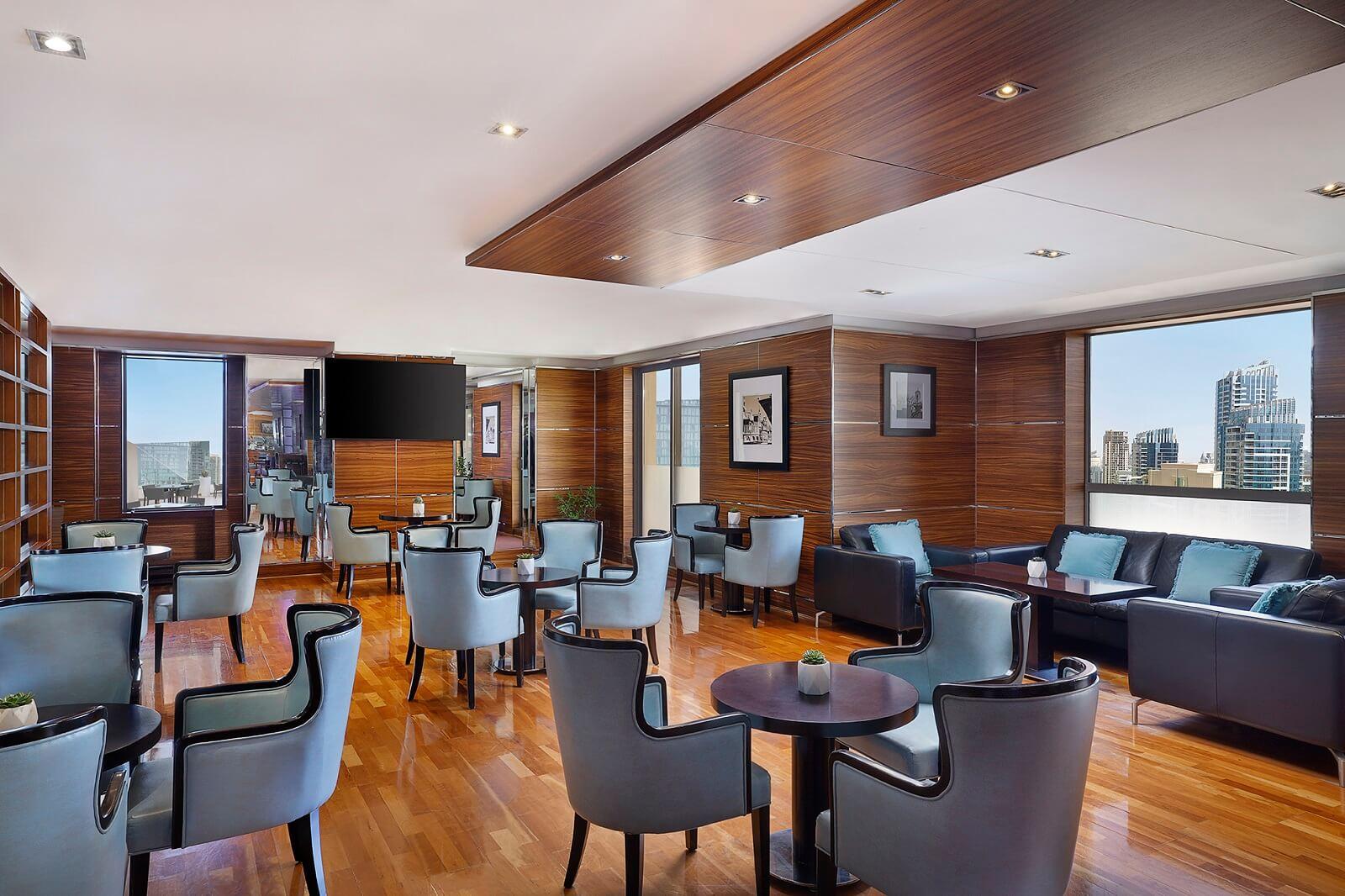 Hilton Dubai The Walk Executive Club Lounge Indoor Dining Tables