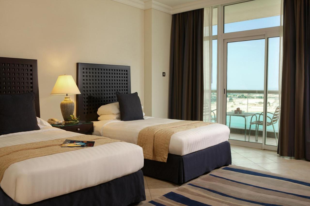 Beach Rotana Twin Bedroom