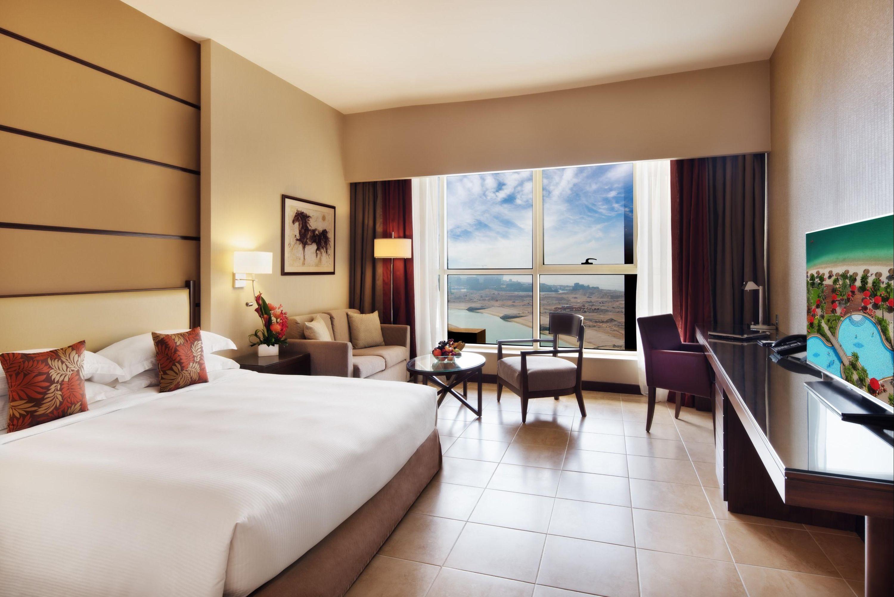 Khalidiya Palace Rayhaan by Rotana King Bedroom