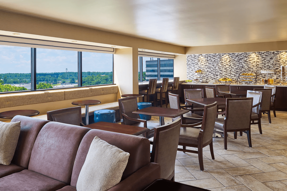 Sheraton North Houston at George Bush Intercontinental Executive Club Lounge Dining Tables